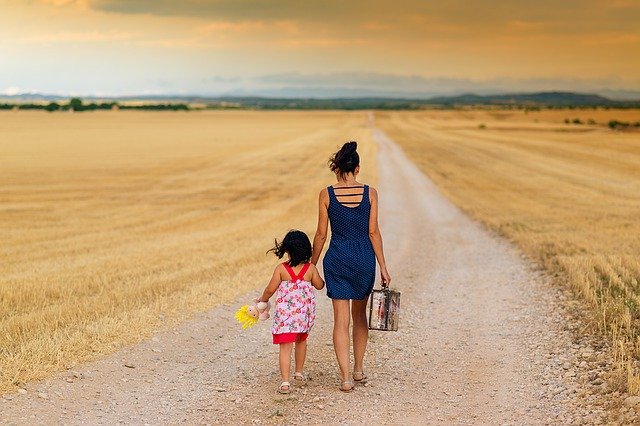 mother-child-walking-down-road
