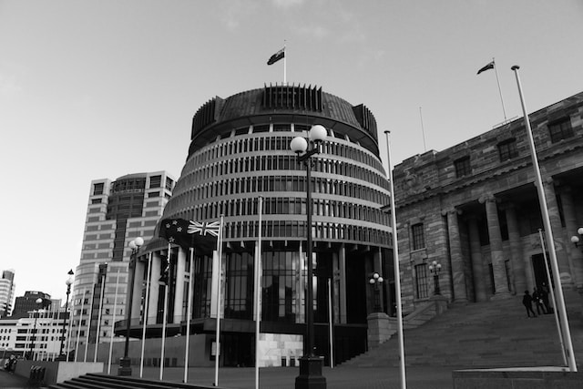 a black and white photo of the Beehive Parliament building in Wellington