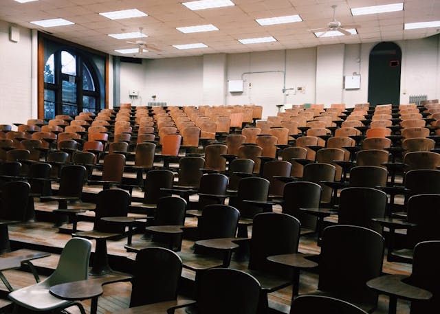 photo of a tertiary classroom with empty chairs